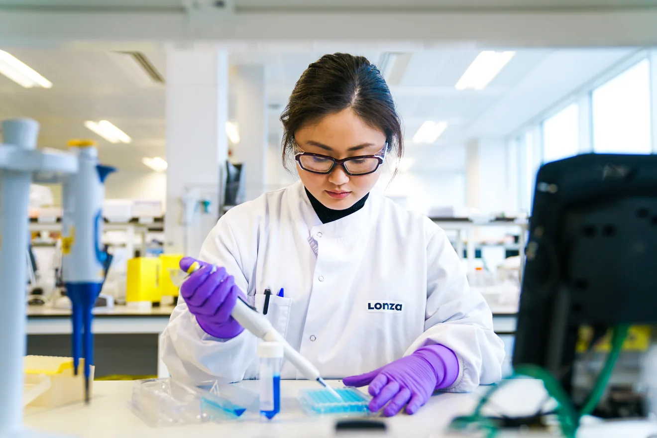 man working with microscope in lab,Process Development,Biologics_Slough_18,,lab in slough,tech working in lab with computer,male tech pipetting,tech holding vial,tech working,Cell Iine process development,biologics lab worker, ,Biologics_Slough_29,Biologics , Biologics Slough 